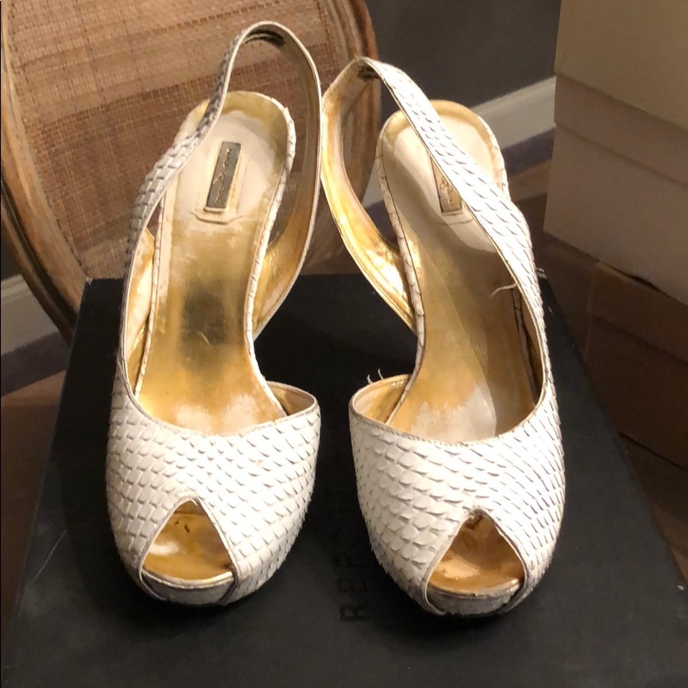 Report snake platform heels
